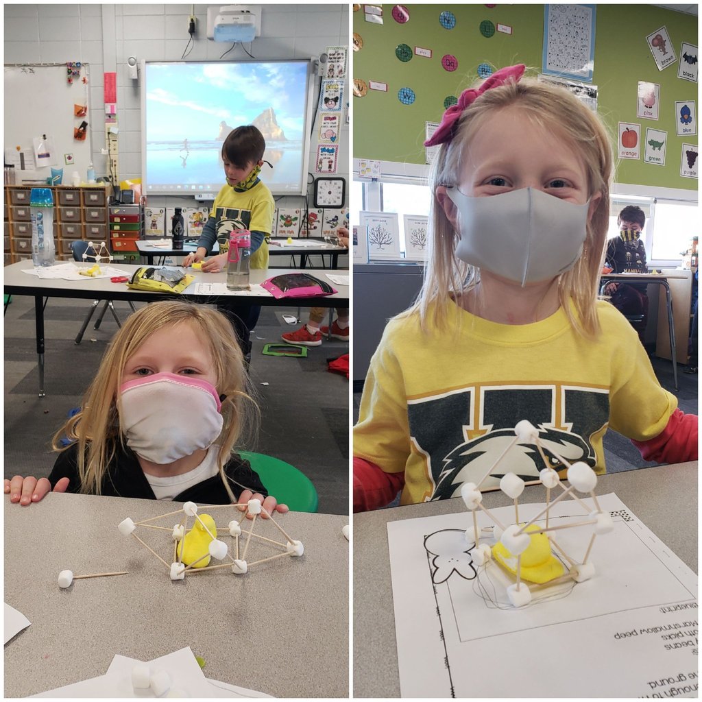 Kindergarten students showing marshmallow engineering projects